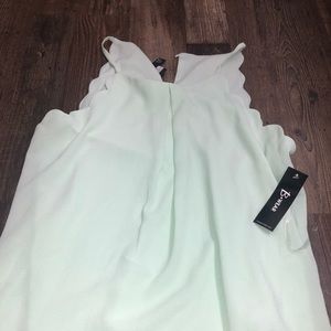 Mint green sleeveless top